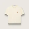 Camiseta de punto blanca para mujer con bordes en contraste y broche desmontable