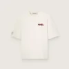 Camiseta unisex de la colección Resort, de algodón blanco con estampado y logotipo