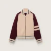 Chaqueta bomber unisex en tejido de punto jacquard blanco y burdeos