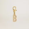 Colgante con la letra B en latón dorado con cristales