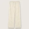 Pantalones de chándal unisex de algodón y lino a rayas en tonos crudo y arena