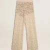 Pantalones de encaje transparente color crema para mujer