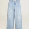 Pantalones de mujer en denim con efecto desgastado