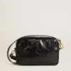 Star Bag en cuero negro brillante con estrella tono sobre tono