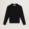 Sudadera negra de la Star Collection con una estrella tono sobre tono en el frente