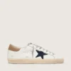 Super-Star para hombre en cuero blanco con estrella de lona azul medianoche y lengüeta del talón de cuero color tabaco