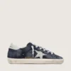 Super-Star para mujer en gamuza azul con estrella plateada brillante y lengüeta de cuero en el talón