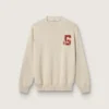 Suéter unisex de cuello redondo en algodón beige con parche en el frente y logotipo en la espalda