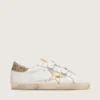 Zapatillas Old School para mujer con estrella dorada en cuero laminado