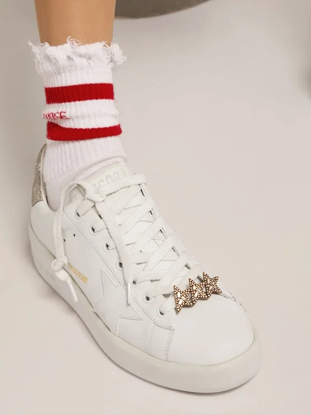 Accesorio de cordones con tres estrellas color oro antiguo con cristales