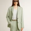 Americana de mujer en lana verde salvia