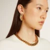 Aretes de aro dorados con cristales