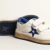 Ball Star Junior con estrella de cuero azul metalizado y lengüeta en el talón