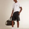 Bermudas negras para hombre con estrellas blancas