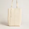 Bolso 24/7 North South en cuero color mantequilla con asas ajustables