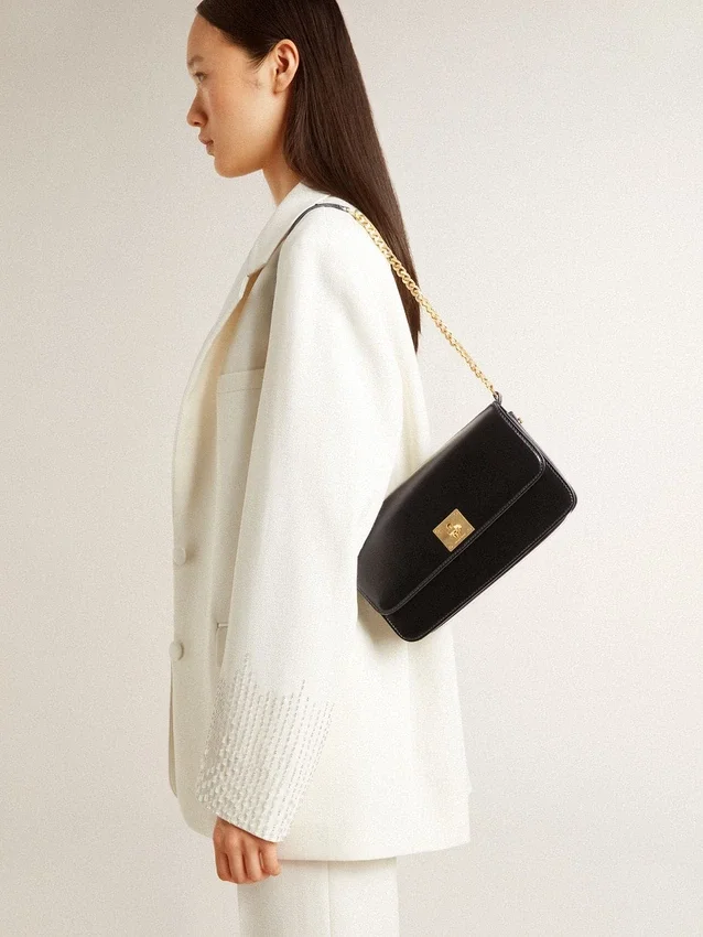Bolso Gioia en piel negra con detalles dorados