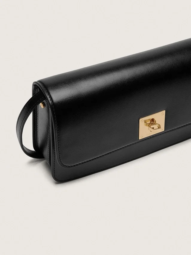 Bolso Gioia en piel negra con detalles dorados