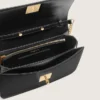 Bolso Gioia en piel negra con detalles dorados