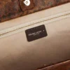Bolso Pasadena de cuero martillado con estampado de leopardo y asas negras en contraste