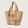 Bolso tipo tote «24.7» en rafia natural y cuero marrón con detalles metálicos dorados