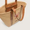 Bolso tipo tote «24.7» en rafia natural y cuero marrón con detalles metálicos dorados