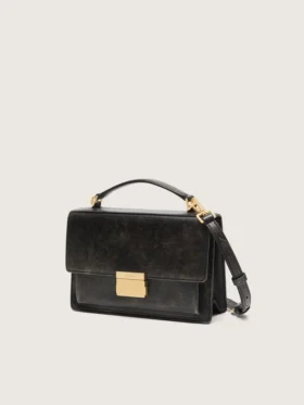 Bolso Venezia en cuero envejecido negro con detalles dorados