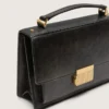 Bolso Venezia en cuero envejecido negro con detalles dorados