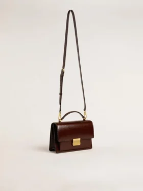 Bolso Venezia en cuero laminado color marrón oscuro con detalles dorados