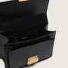 Bolso Venezia en cuero negro con detalles dorados