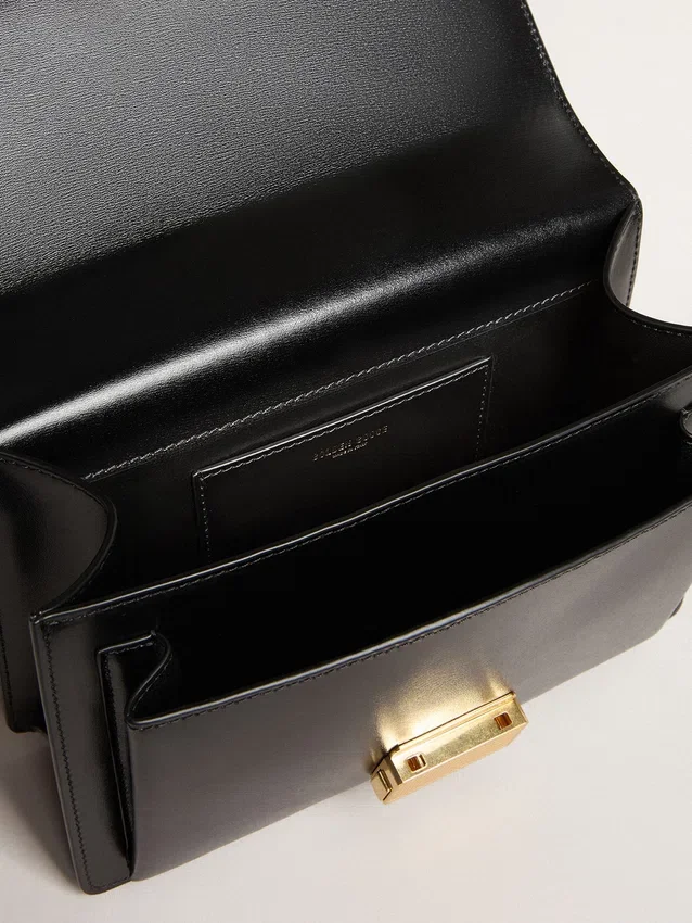 Bolso Venezia en cuero negro con detalles dorados