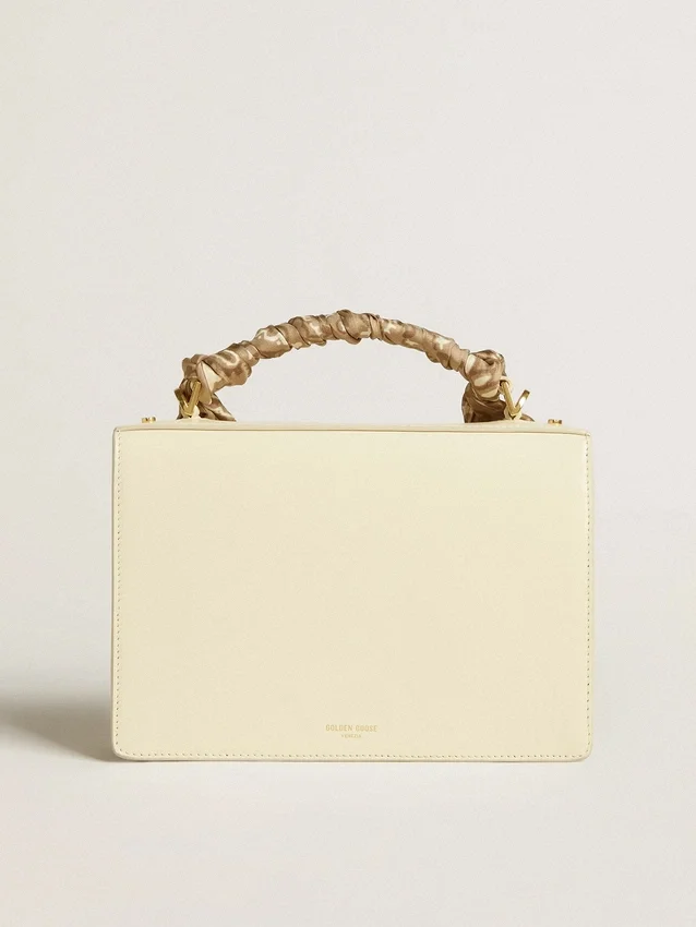 Bolso Venezia en piel de color mantequilla con pañuelo de seda