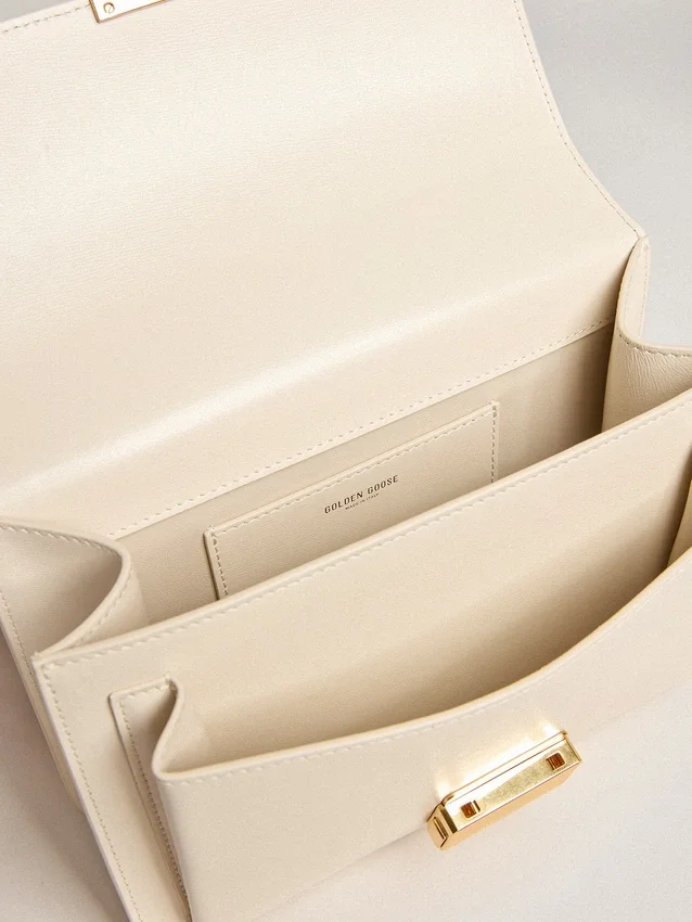 Bolso Venezia en piel de color mantequilla con pañuelo de seda