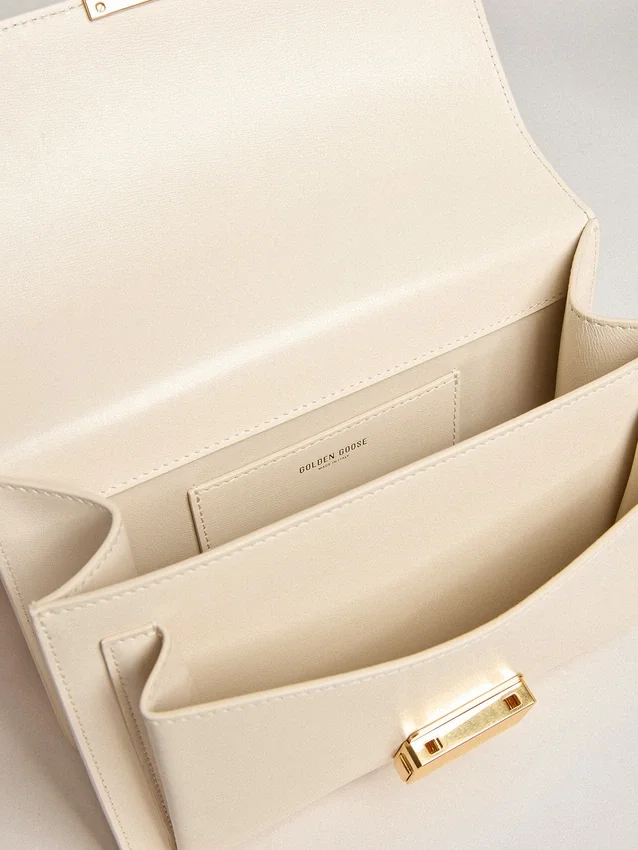 Bolso Venezia en piel de vacuno color mantequilla con detalles dorados