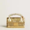 Bolso Venezia pequeño en cuero dorado metalizado con detalles dorados