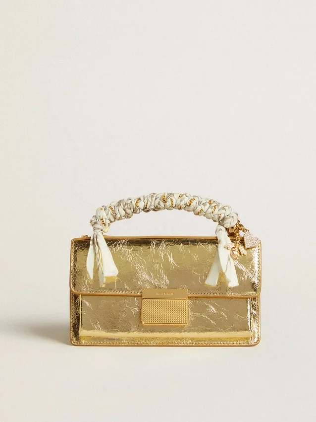 Bolso Venezia pequeño en cuero dorado metalizado con detalles dorados
