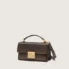 Bolso Venezia pequeño en cuero marrón oscuro con hebilla dorada