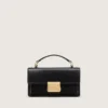 Bolso Venezia pequeño en cuero negro con detalles dorados