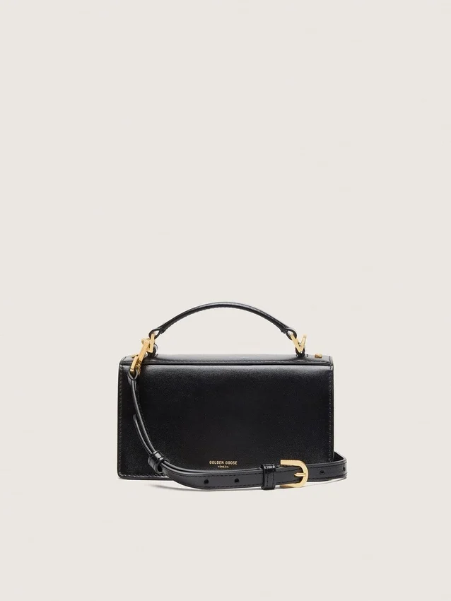 Bolso Venezia pequeño en cuero negro con detalles dorados