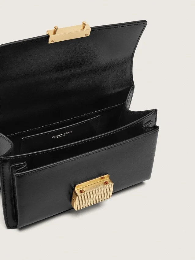 Bolso Venezia pequeño en cuero negro con detalles dorados