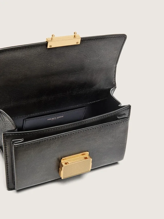 Bolso Venezia pequeño en cuero negro envejecido con detalles dorados