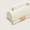 Bolso Venezia pequeño en cuero repujado color mantequilla con detalles dorados