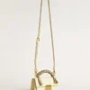 Bolso Venezia pequeño en piel con relieve color mantequilla y bufanda trenzada