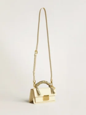 Bolso Venezia pequeño en piel repujada color mantequilla con bufanda trenzada y doble dije