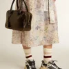 Bolso Vita en cuero envejecido negro con detalles dorados