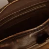 Bolso Vita en cuero envejecido negro con detalles dorados