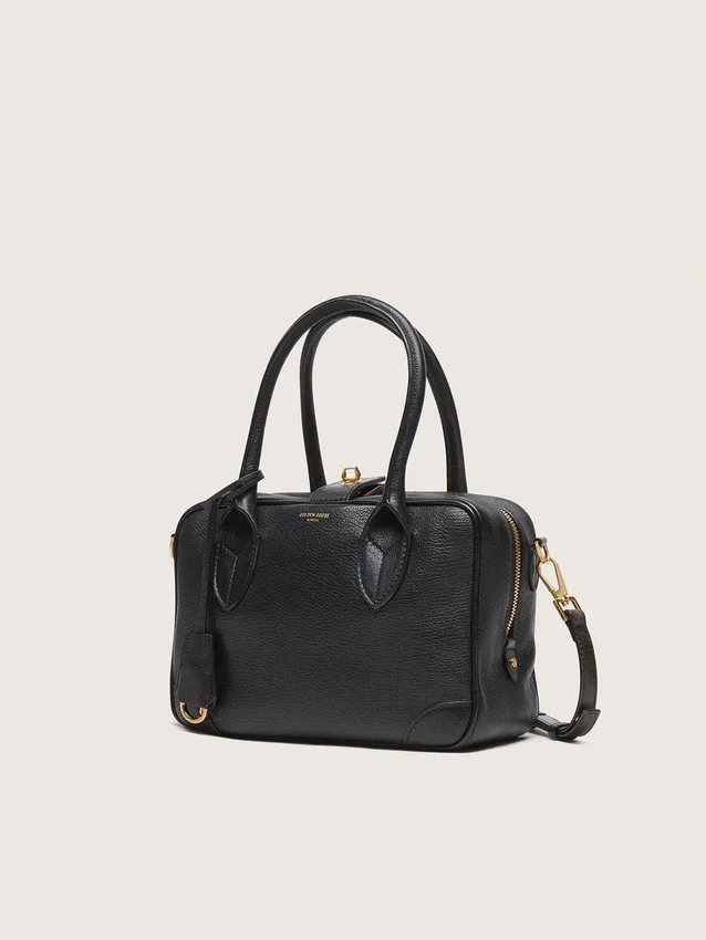 Bolso Vita en piel de oveja negra con detalles dorados