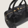 Bolso Vita en piel de oveja negra con detalles dorados