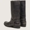 Botas moteras altas para mujer en cuero negro con correa y hebilla plateada