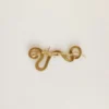 Broche con forma de serpiente en oro antiguo