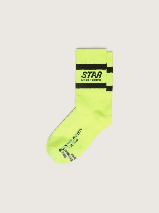 Calcetines deportivos amarillo neón con rayas negras